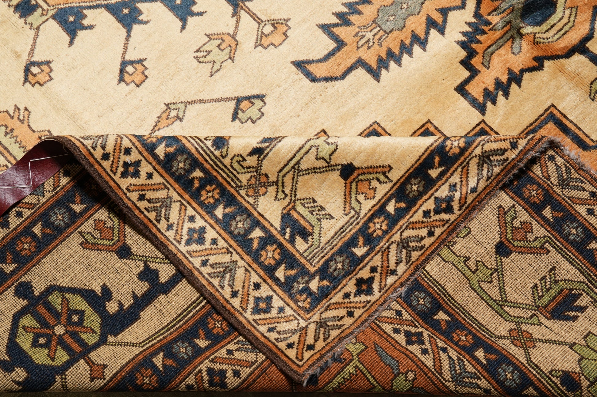 Afghan Chechen Kazak rug, corner motif with intricate tribal arabesques