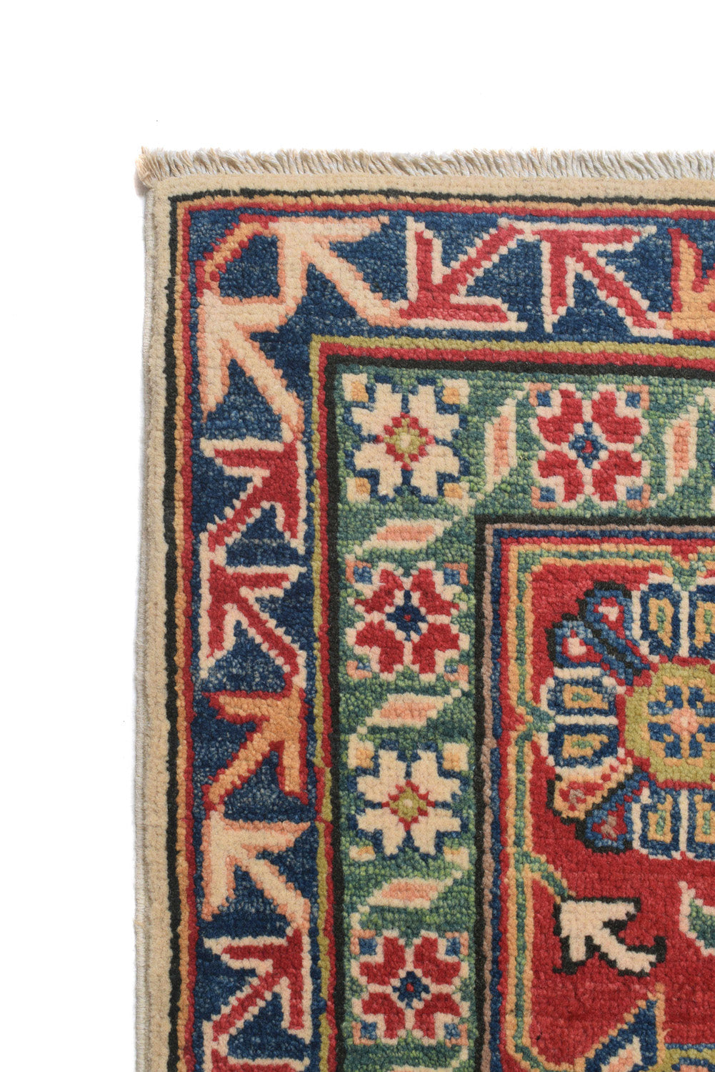 Afghan Kazak ivory rug, border pattern detail in red and ivory