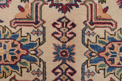 Afghan Kazak ivory rug, corner motif with tribal geometry