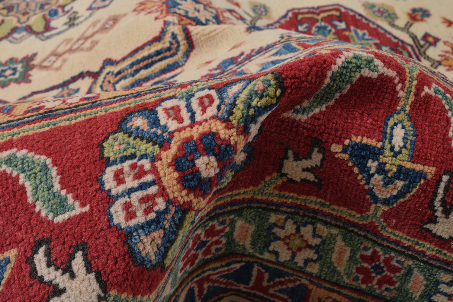 Afghan Kazak ivory rug, edge and selvedge detail