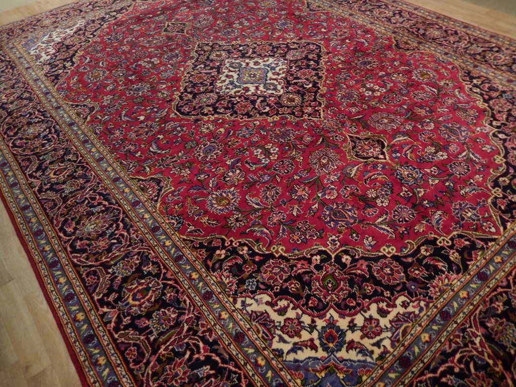 Semi-antique maroon Kashan-style rug, corner motif with floral arabesques