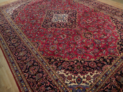 Semi-antique maroon Kashan-style rug, corner motif with floral arabesques