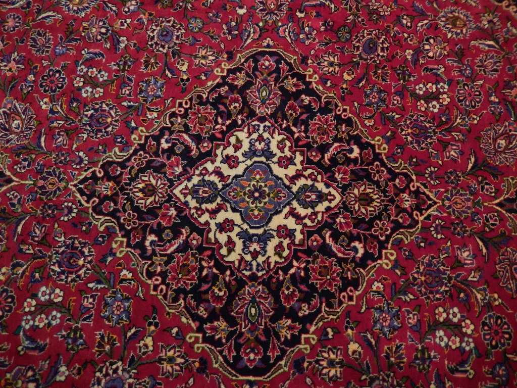 Semi-antique maroon Kashan-style rug, color balance close-up showing maroon depth