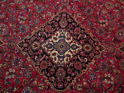 Semi-antique maroon Kashan-style rug, color balance close-up showing maroon depth
