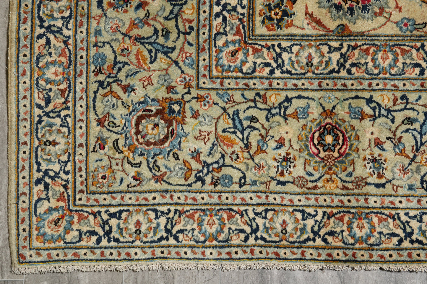 Vintage Kashan-style ivory rug, alternate corner showing floral continuity