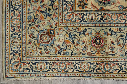Vintage Kashan-style ivory rug, alternate corner showing floral continuity