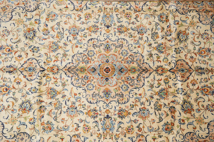 Kashan-style ivory floral rug, border pattern in navy and red