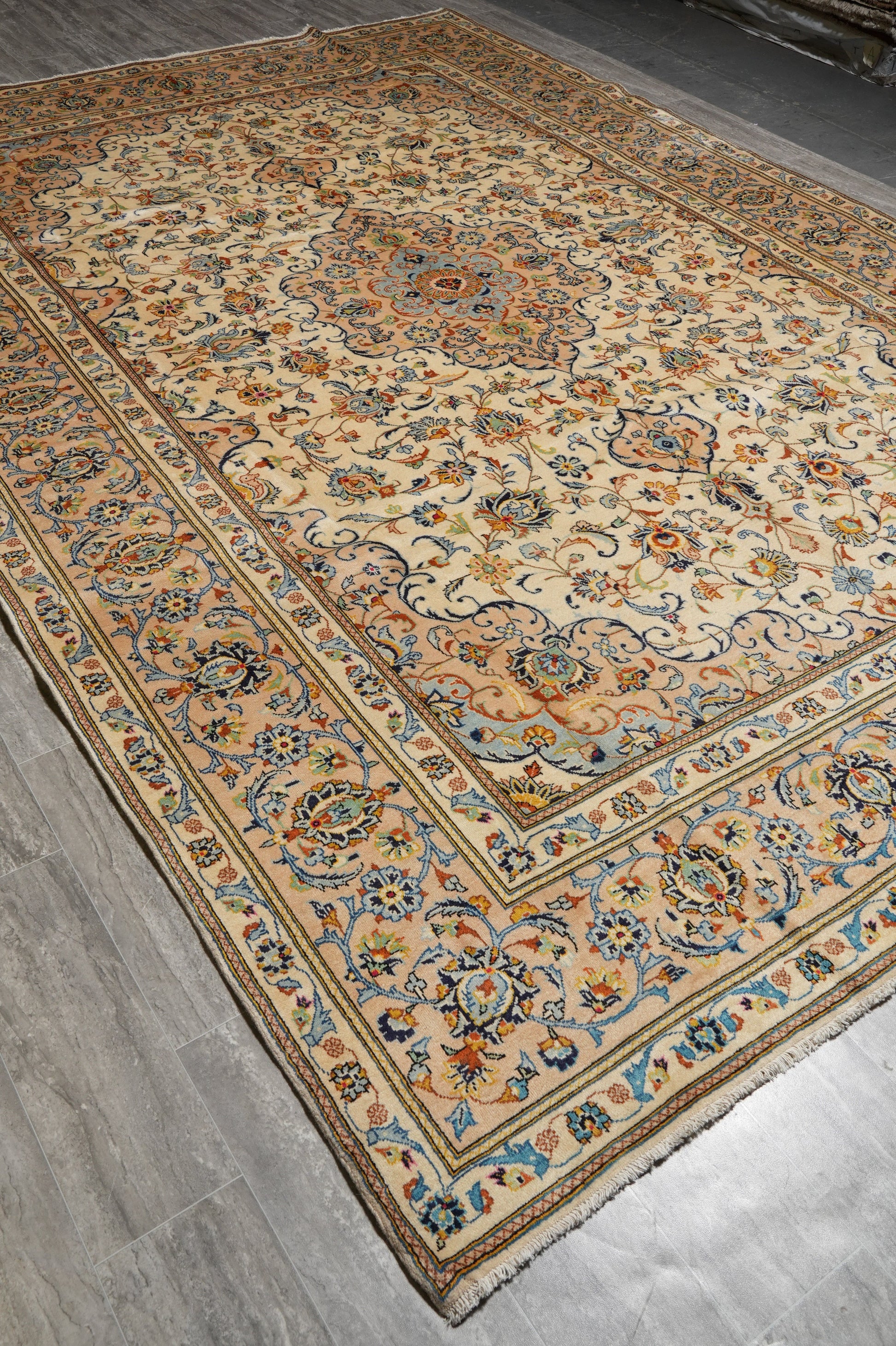 Kashan-style ivory floral rug, mid-field detail showing color depth