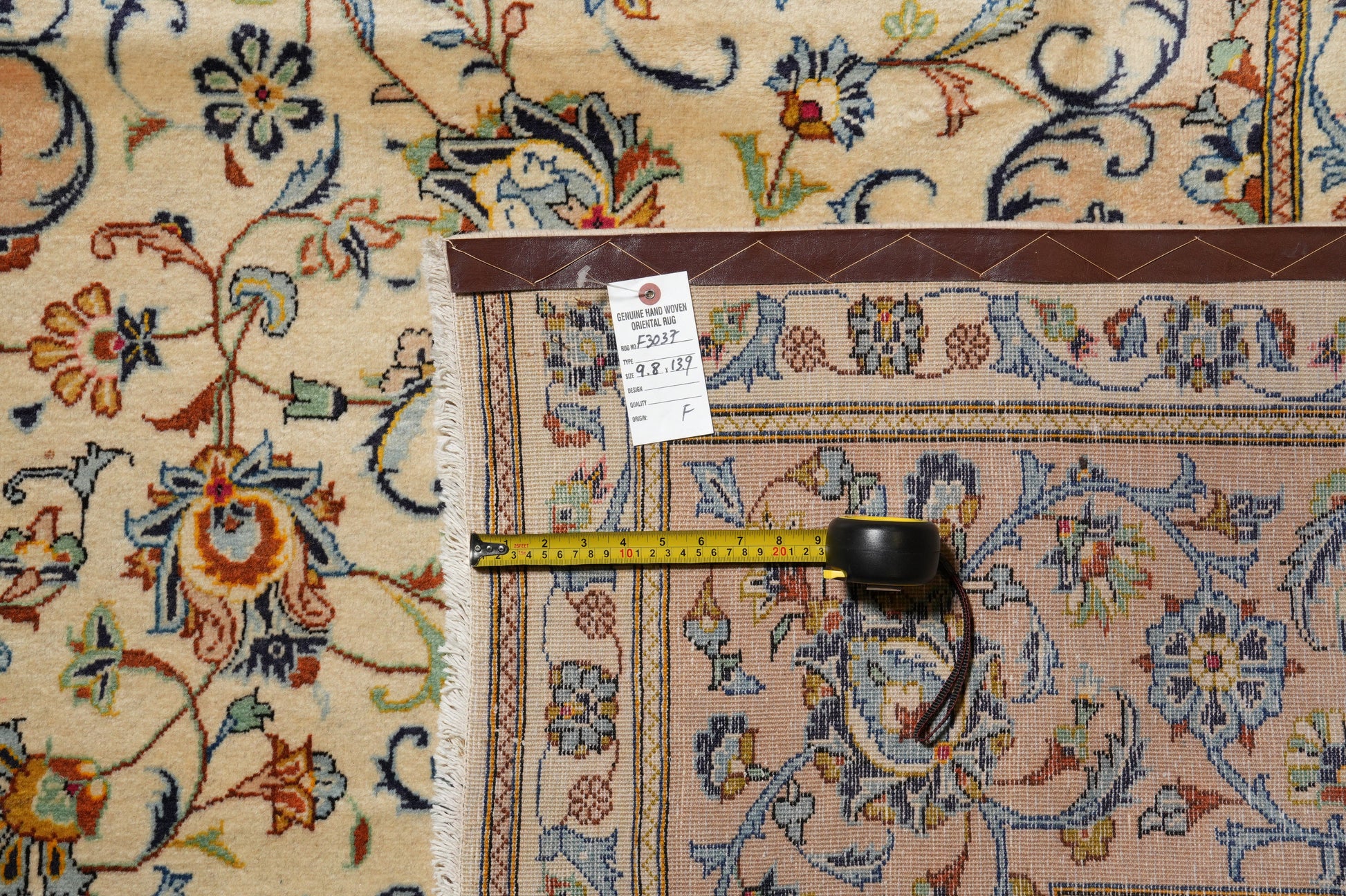 Kashan-style ivory floral rug, wide alternate-angle full layout