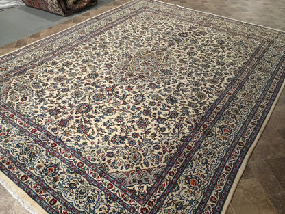 Semi-antique Kashan-style ivory rug, curvilinear floral detail