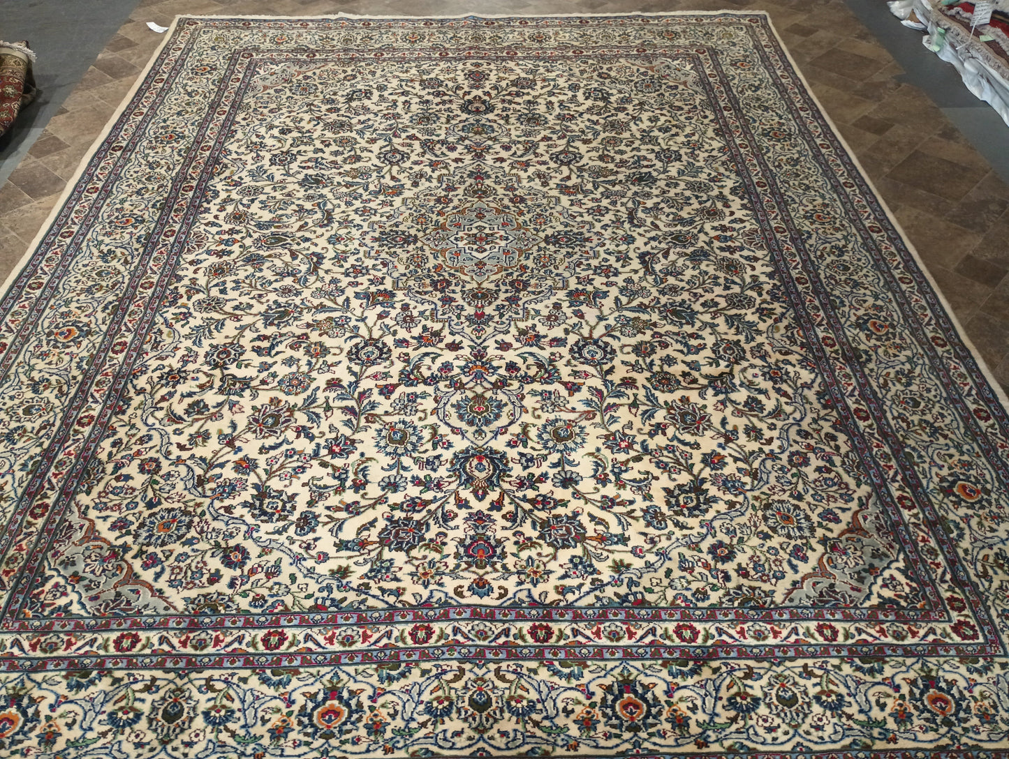 Semi-antique Kashan-style ivory rug, color balance close-up showing ivory field