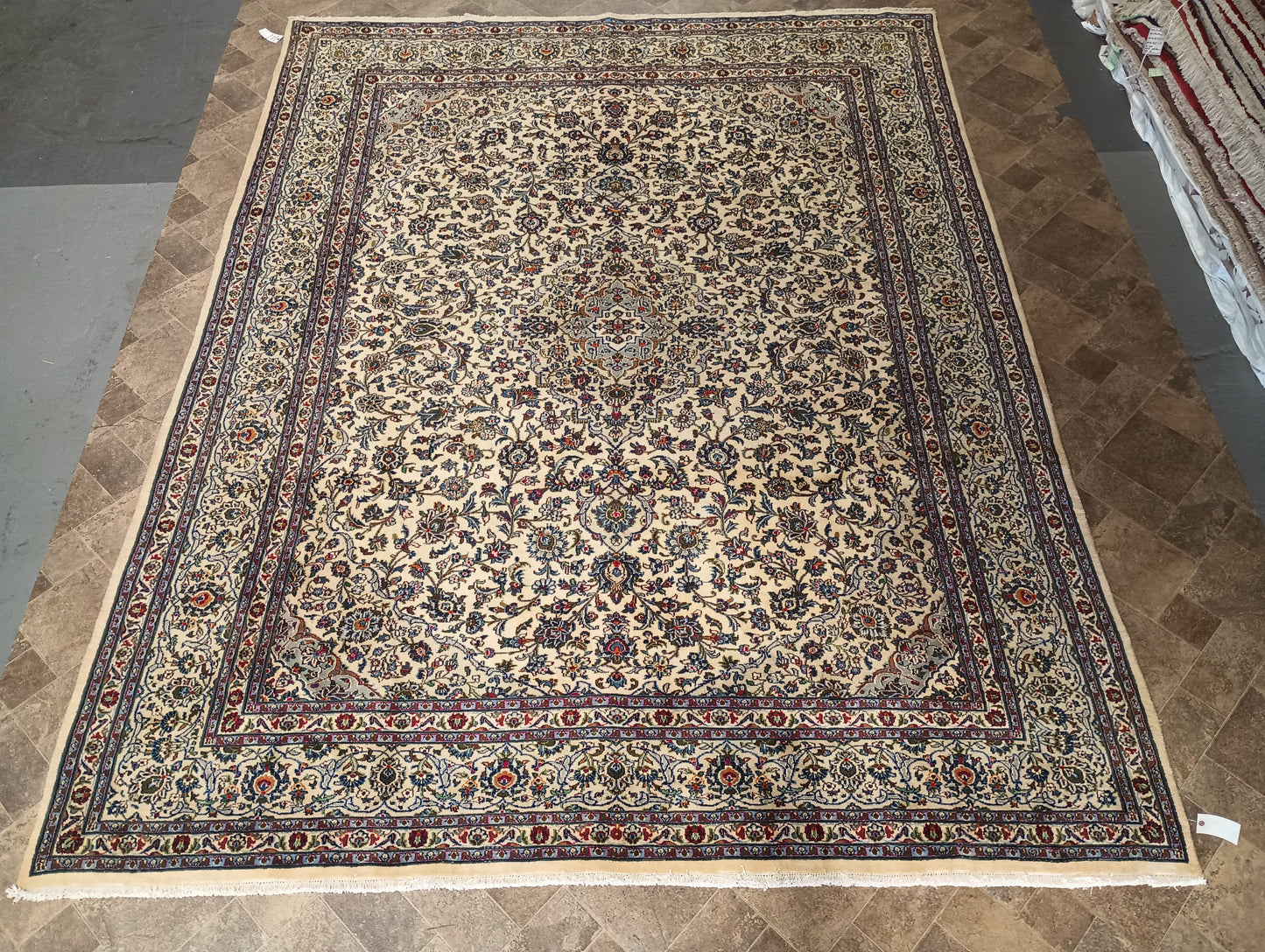 Semi-antique Kashan-style ivory rug, alternate angle with full medallion view