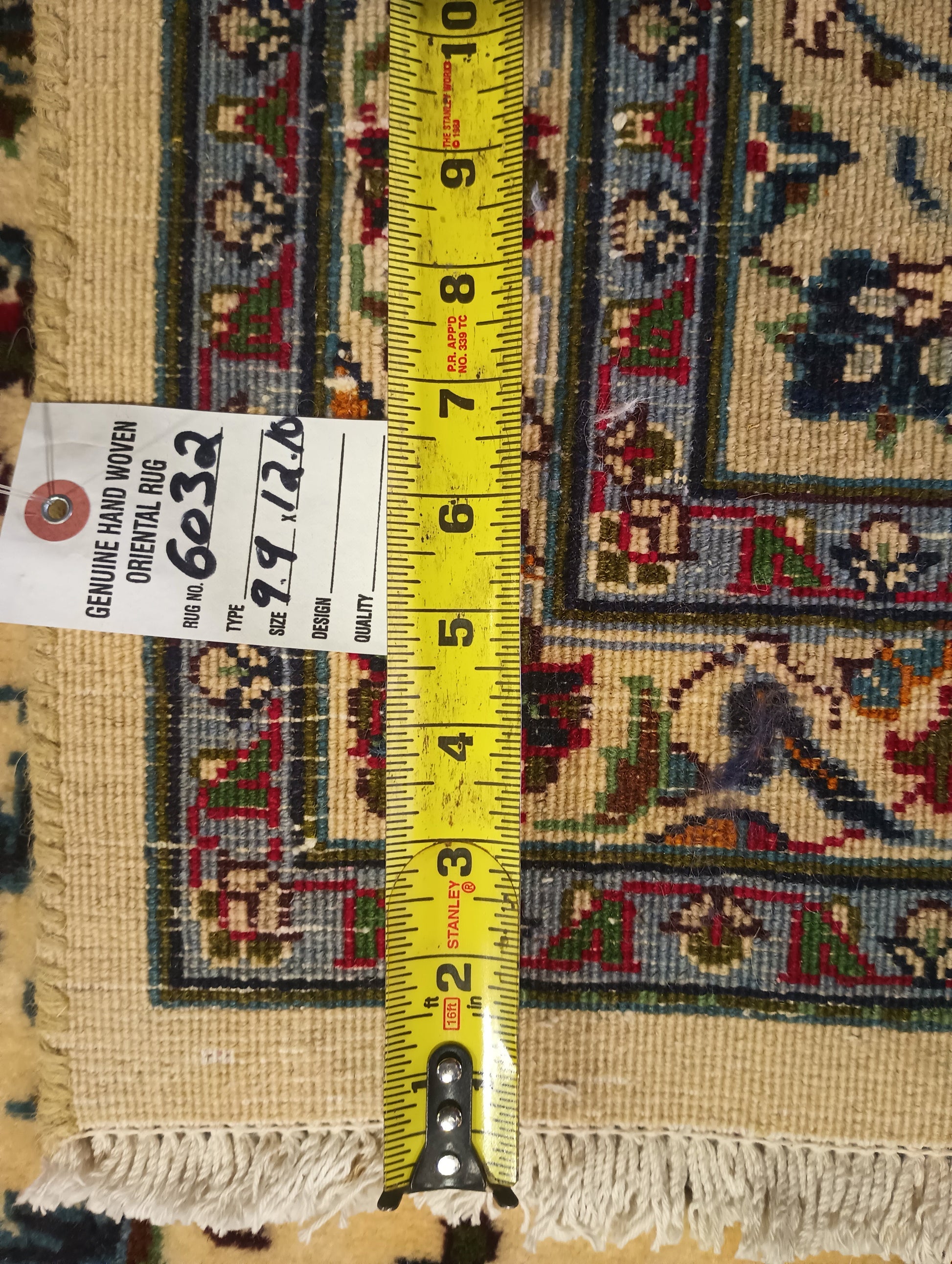 Semi-antique Kashan-style ivory rug, full layout in natural light