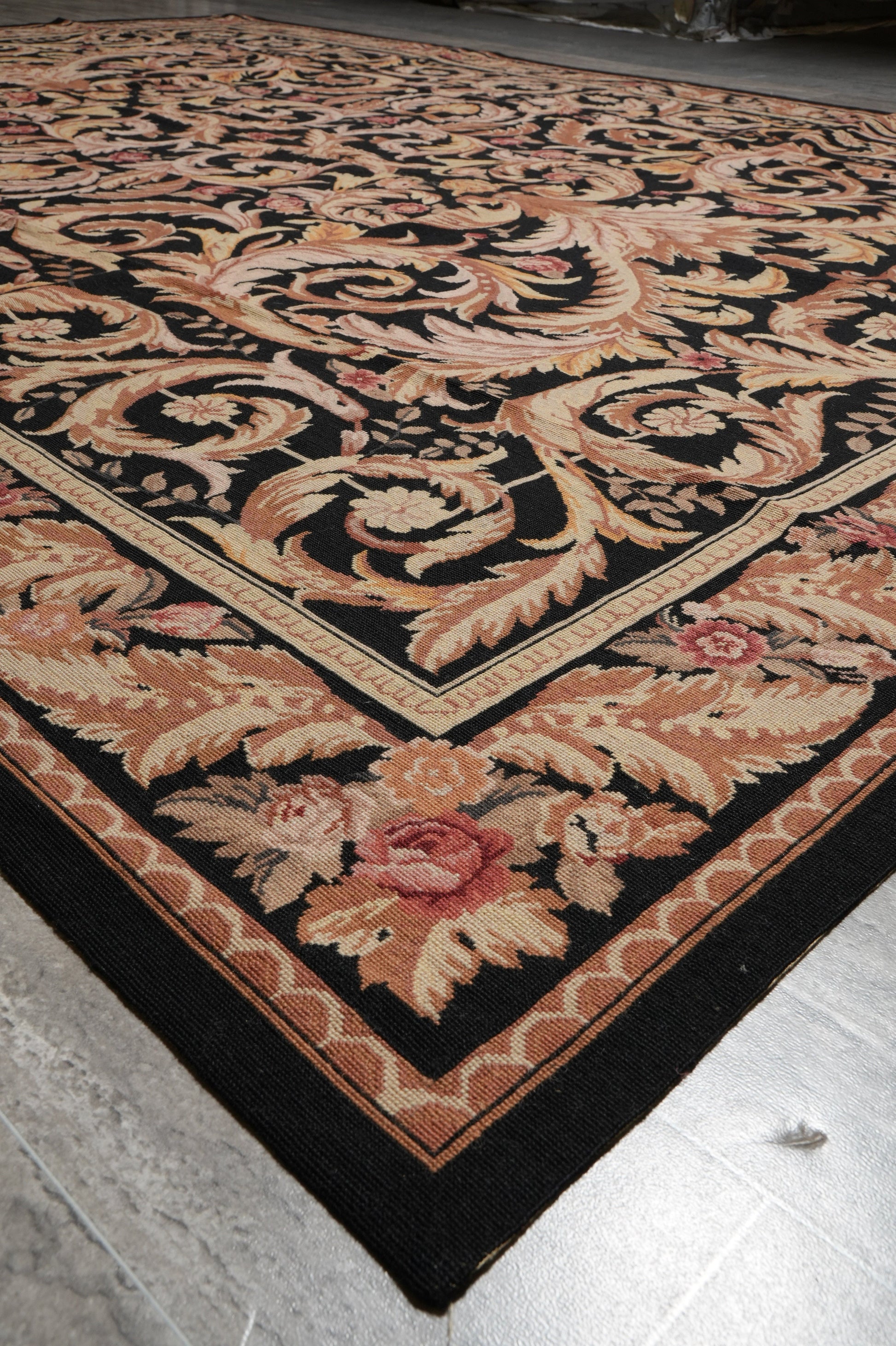Black Aubusson rug, weave texture showing flat-weave construction