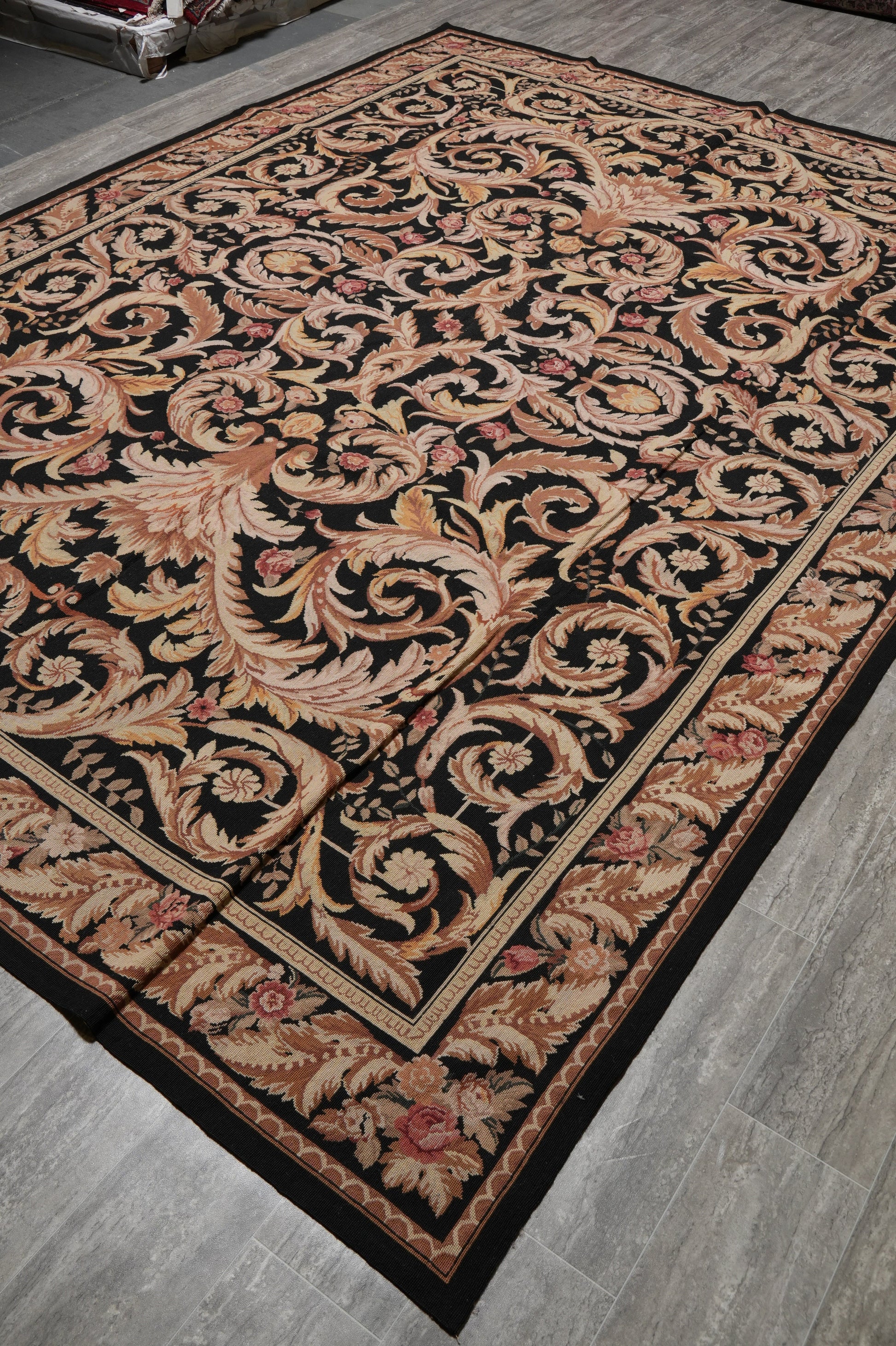 Black Aubusson rug, edge and selvedge close-up