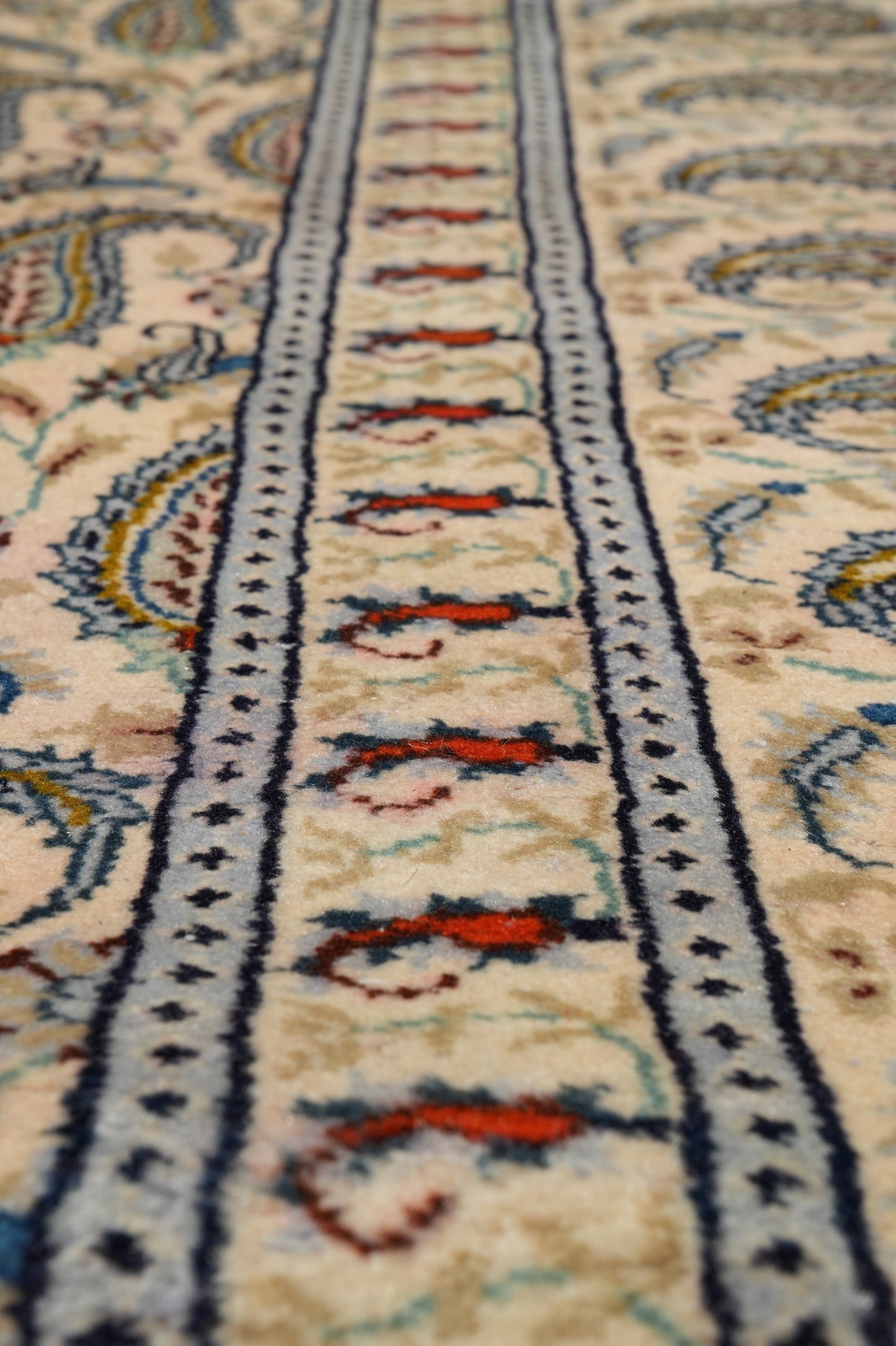 1970s paisley Kashan-style rug, color balance close-up of navy field