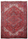 9 x 13 hand-knotted Heriz-style wool rug, top view of red and ivory geometric medallion